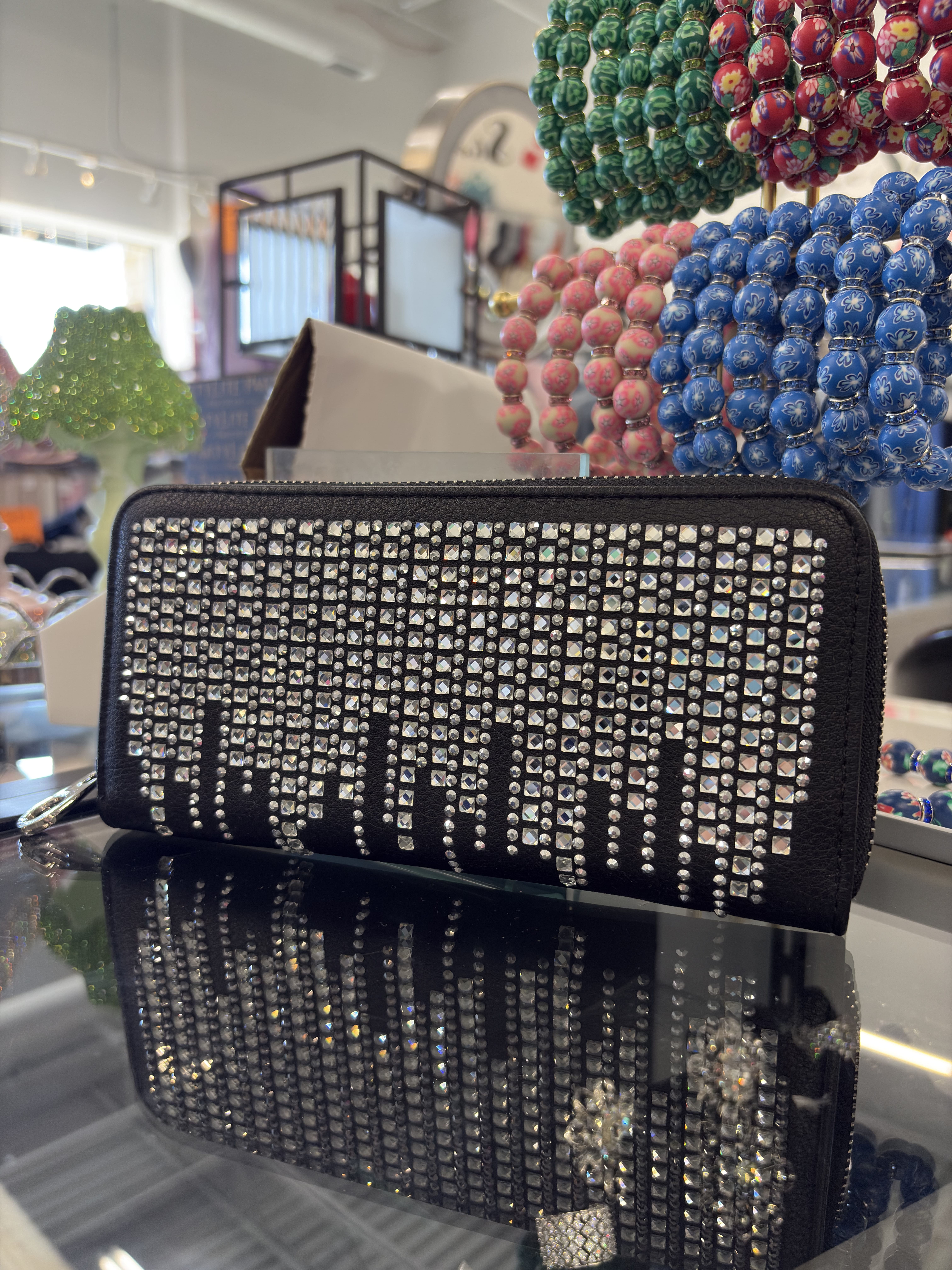 Black wing rhinestone handbag