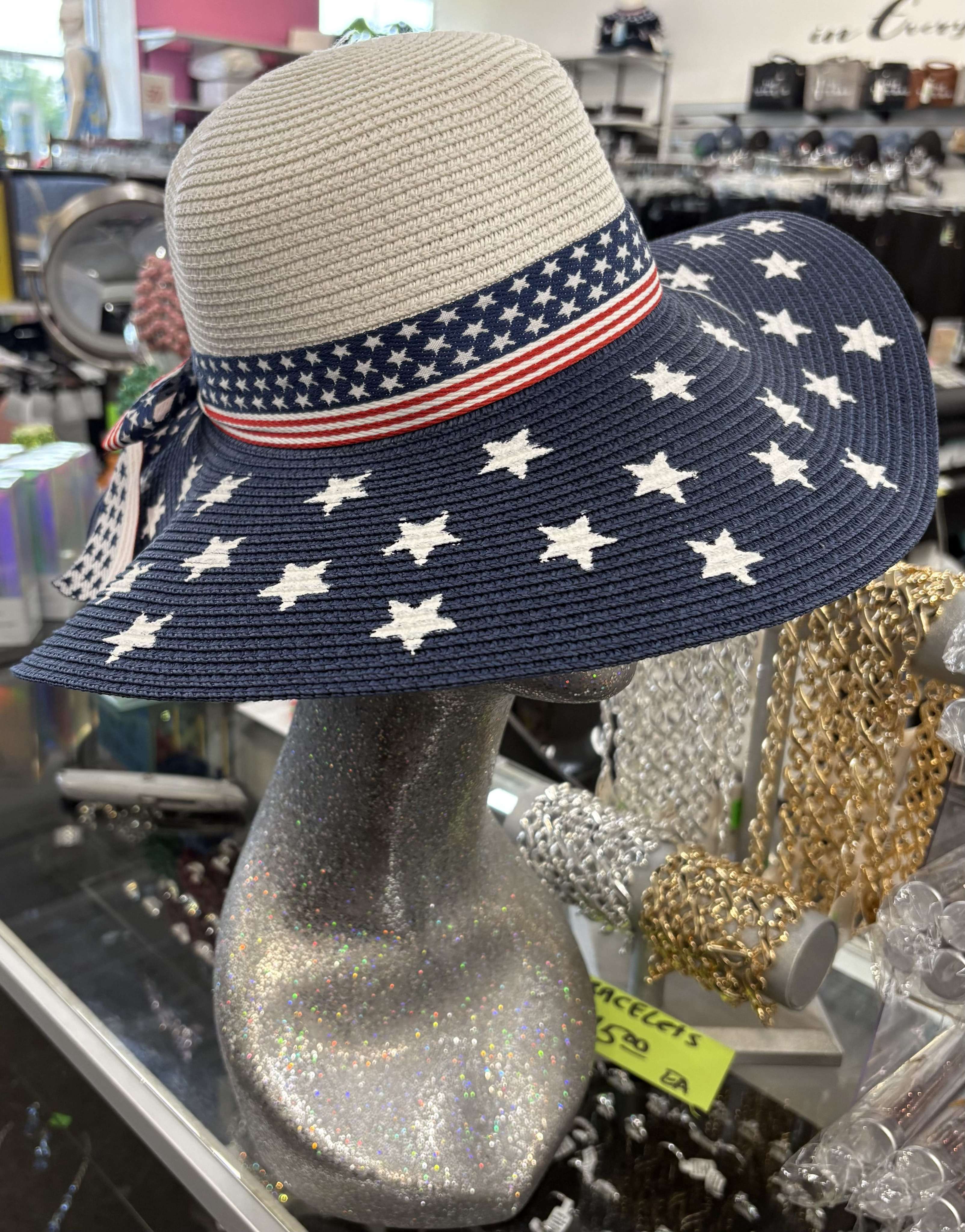 Black and straw rhinestone visor